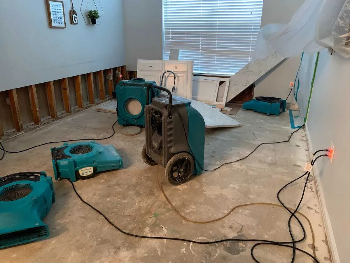 Dehumidifier in flood-cut room for Water Damage Restoration in Woods Creek